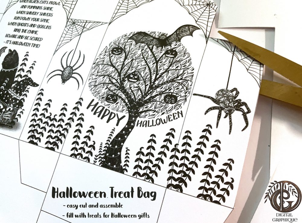 cutting out the halloween treat box, halloween printables,halloween tags,halloween templates,halloween party templates,halloween bookmarks,halloween treat bags,halloween gifts, digital graphique