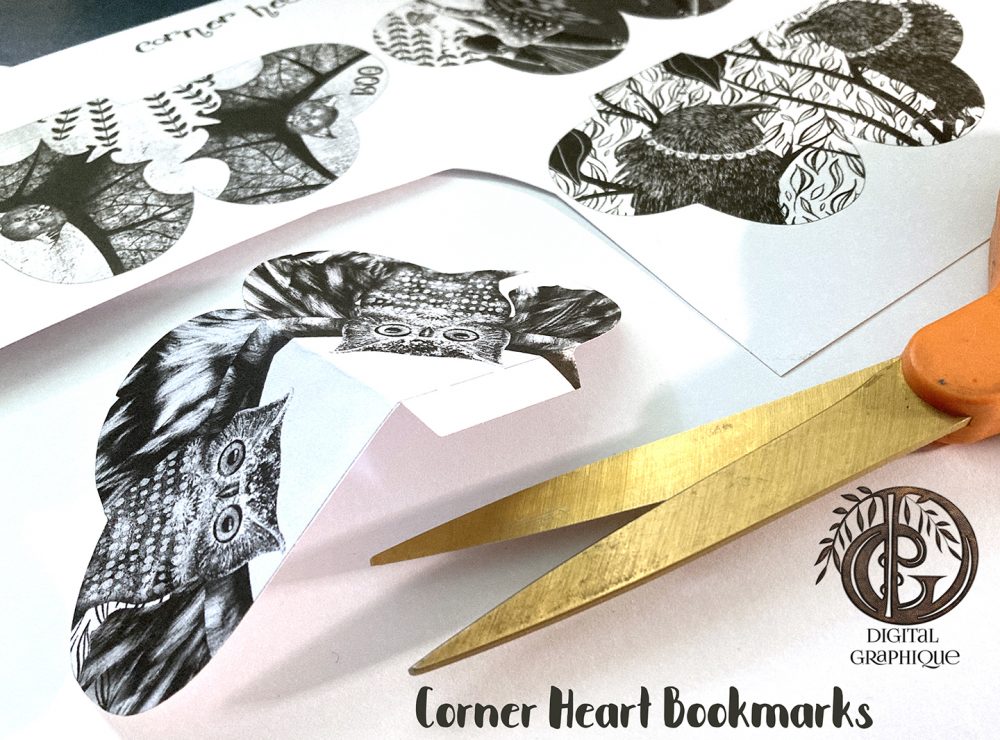 cutting out the halloween corner heart bookmarks, halloween printables,halloween tags,halloween templates,halloween party templates,halloween bookmarks,halloween treat bags,halloween gifts, digital graphique